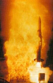 fired missle amid flames
